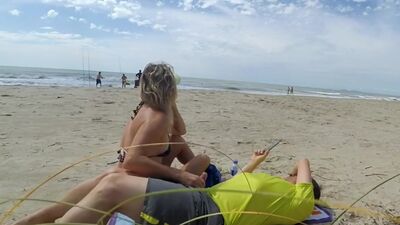 Real amateur public handjob on the beach