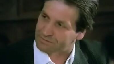 Hairy pussy fingering under the table in this vintage porno video