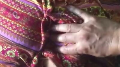 Hot latina amateur milf babe with juicy ass is laying on the bed