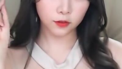 Sexy asian girl in mini dress