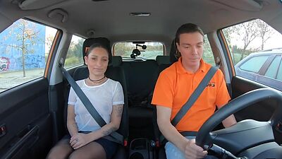 Petite student driver publicly sucking her instructor