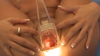 Speculum babe stretches out pussy after masturbating