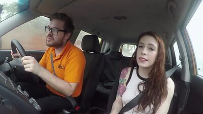 Redhead driving student fucks her instructor in the car
