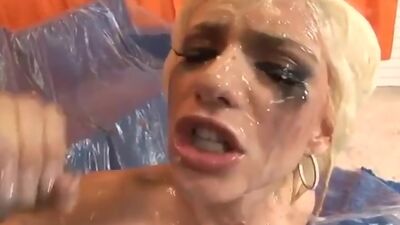 Facialized bukkake bitch takes cum