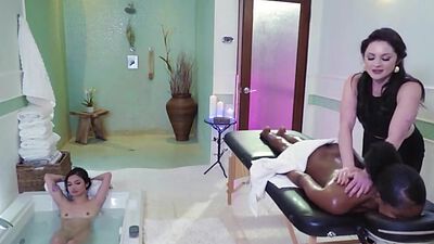 Curvy ebony and her girlfriend lick the pussy of their masseuse