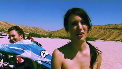 Big boobed badass nude babes trying motocross in the desert