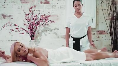 Brunette masseuse rubs and licks the pussy of her client