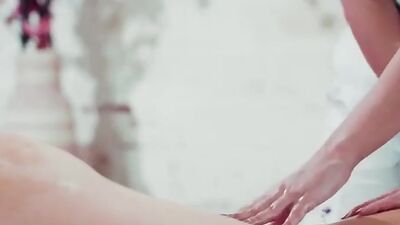 Brunette masseuse rubs and licks the pussy of her client