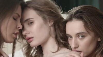 Three sexy Ukrainian Playboy MILF models strip in front of a Christmas tree