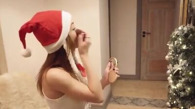 A Christmas costume is cute on sweet teen Nata Ocean.