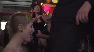 Public slut sucking before analsex in front of voyeurs