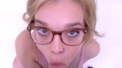Blonde with glasses makes hard cock cum in studio