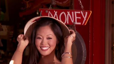 Exotic asian beauty Grace Kim stripping during playing on a guitar