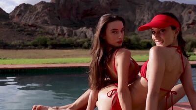 Small tits brunette MILFs Sofi Ka and Gloria Sol posed naked in the pool