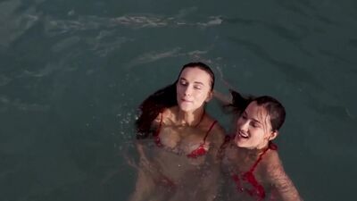 Small tits brunette MILFs Sofi Ka and Gloria Sol posed naked in the pool