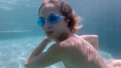 Gorgeous petite model Clarise enjoyed passion diving after hot striptease