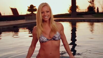 Fantastic blonde model Nikki Leigh exposed big boobs after hot striptease