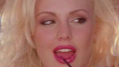Fantastic blonde model Nikki Leigh exposed big boobs after hot striptease