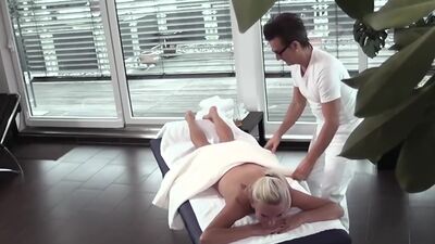 Blonde milf gets it rough on the massage table