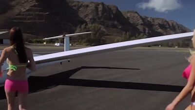 Naked badass Talor Paige and her big boobed GFs take a fly on a glider