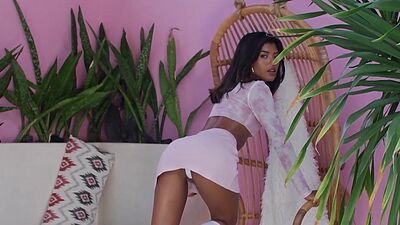 Petite asian beauty Moana Rosi flashes her small tits in a hammock