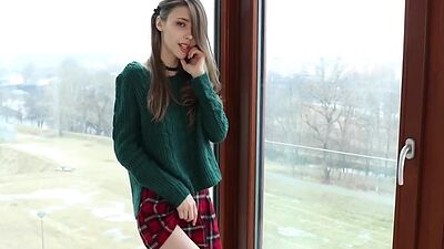 Doe eyed solo teen schoolgirl strips