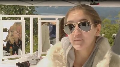 Hot blondies in sexy lingeries showing their big boobs on a snowy mountain