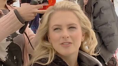 Hot blondies in sexy lingeries showing their big boobs on a snowy mountain