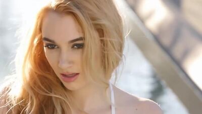 Wet blonde model Ivy Jones showing amazing naked body and posing outdoor