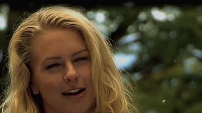 Hot babes with massive boobs preparing for an erotic photoshoot session