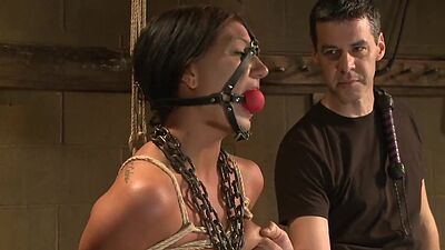 Bound to the floor slave gets flogged