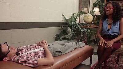 Ebony makes cuckold sucking cock