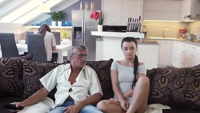 Skillful old man manages to fuck comely brunette on sofa