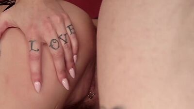 Punk rock Goddess pegging inked man