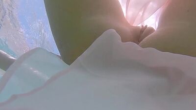 Petite Russian beauty Katya Clover showing her shaved pussy under the water