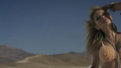 Big boobed glamorous babes riding on sand yachts and posing in the desert