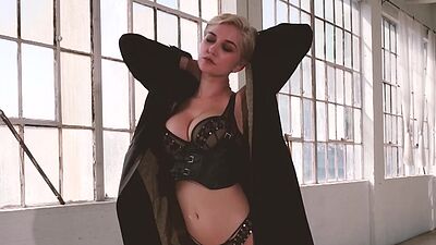 Short haired blondie Skye Blue showing her bombastic natural boobs