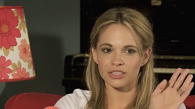 Big boobed naked blondie Danielle Mathers posing on a horse outdoor