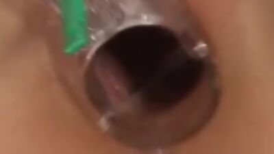 Pissing babe oils body fingers and gapes her shaved pussy