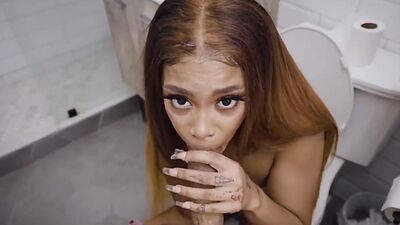 My stepsister enjoys sucking my throbbing cock so deep