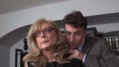 Mature secretary in lingerie fucked by BWC colleague