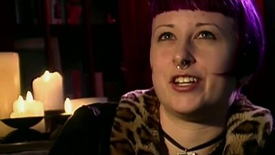 Inked goth babe Six with perced nipples shows her new tattoo to lesbian GF