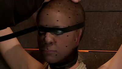 Tiny busty blonde bound to the wall