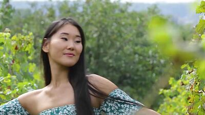 Tiny titted asian beauty Katana Storm stripping at a vineyard outdoor