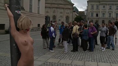 Naked and gagged blonde in public