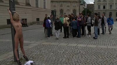 Naked and gagged blonde in public