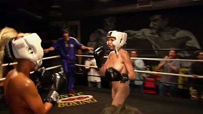 Ebony pornstar Angela Lady Armani and Jamie Lynn fighting in a boxing ring