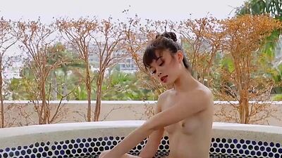 Bath time with petite Asian teen Sowan and babe showed her perfect body