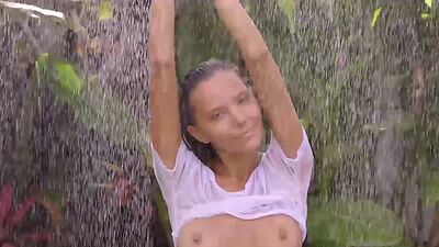Nude all natural Russian babe Katya Clover cooilng herself down in the rain part 2