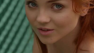 Petite redhead teen with nice small tits Kate Great posing on the bridge